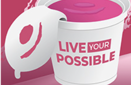 a pink and white bucket that says live your possible