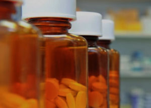 medication in orange pill bottles